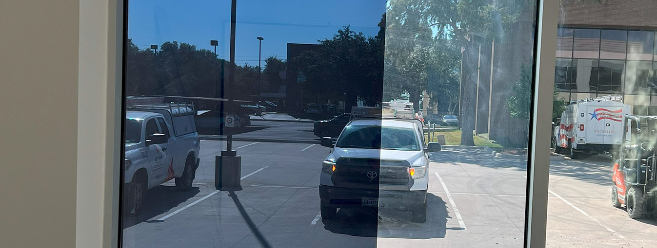 Window tint on a commercial building's window.