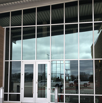 an exterior shot of tinted windows in a commercial building
