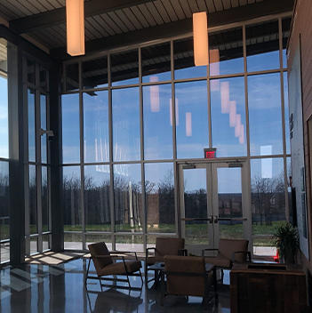 an interior shot of tinted windows in a commercial building