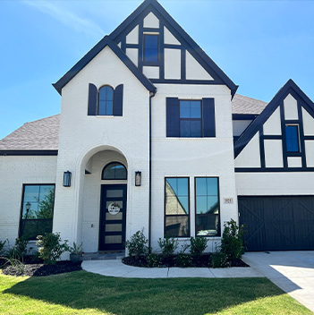 an exterior shot of tinted windows on a home